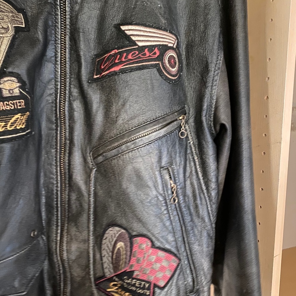 Black Guess distressed leather reversible jacket.